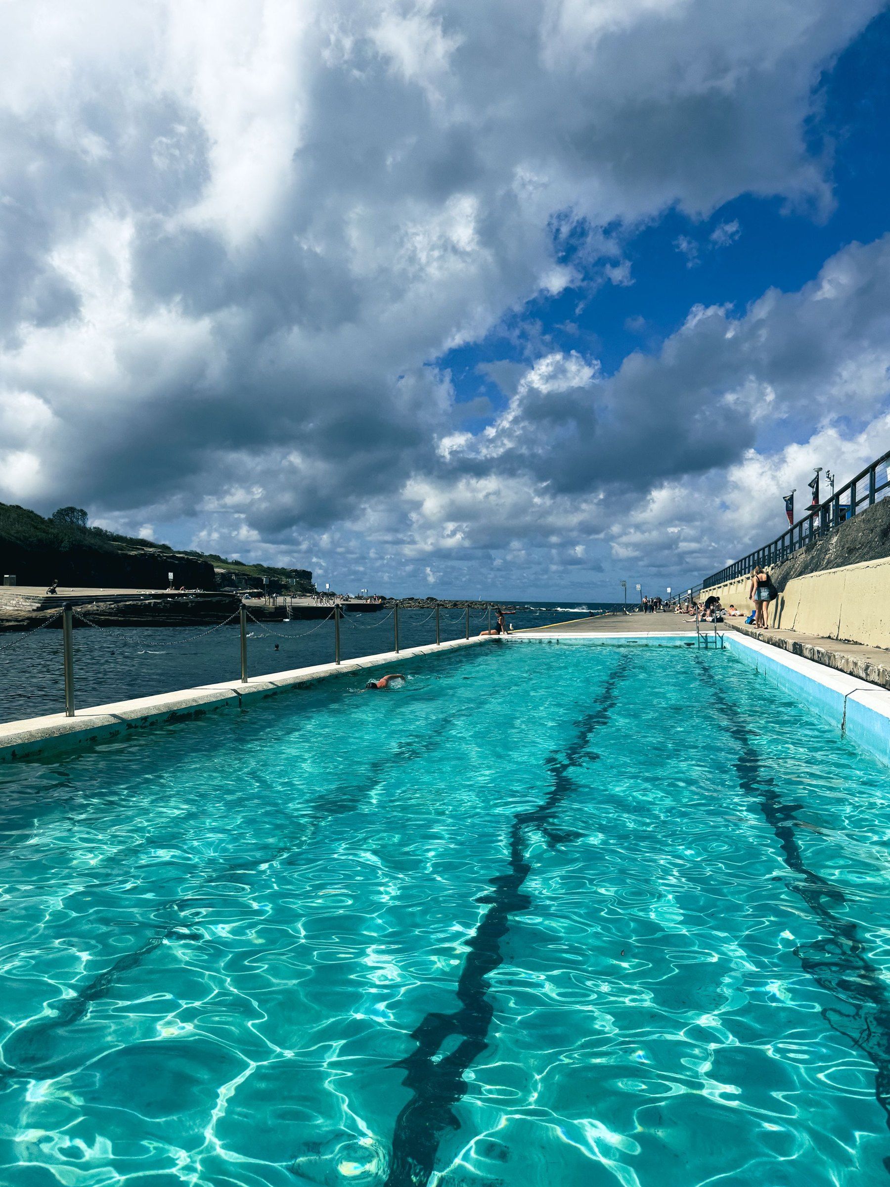 The clear saltwater pool on the platform at Clovelly on a sunny day
