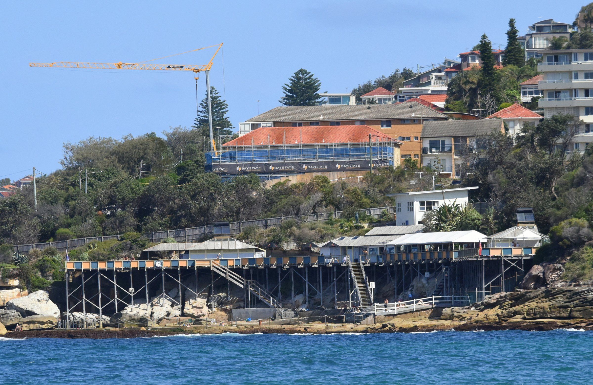 Wylie’s Baths on the rocks south of Coogee Beach, seen from the water