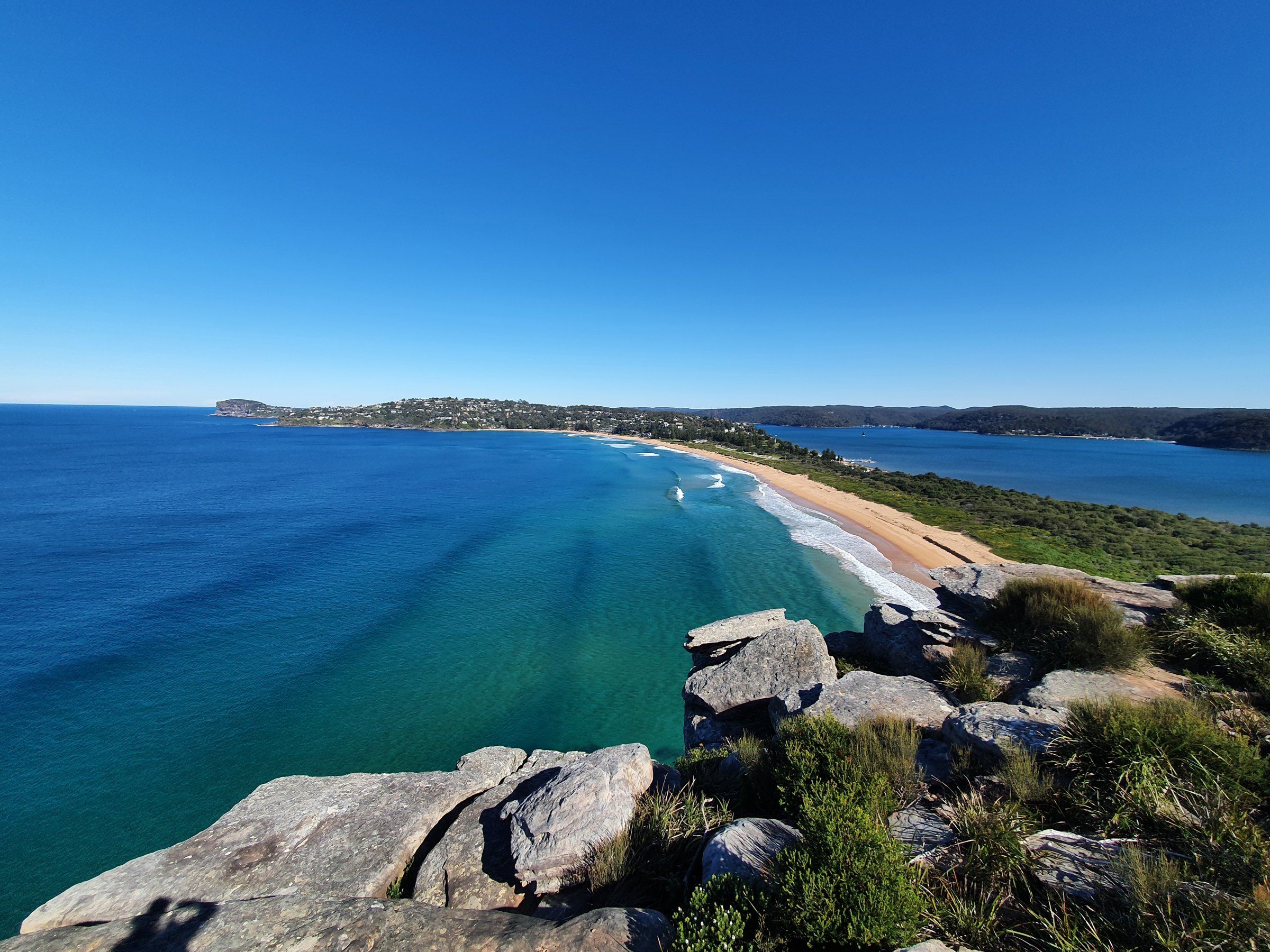 Palm Beach seen from Barrenjoey Lighthouse, the long ocean beach curving south